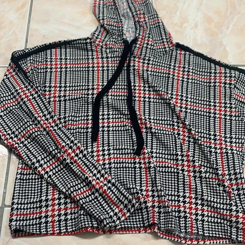 black,red,and white shirt